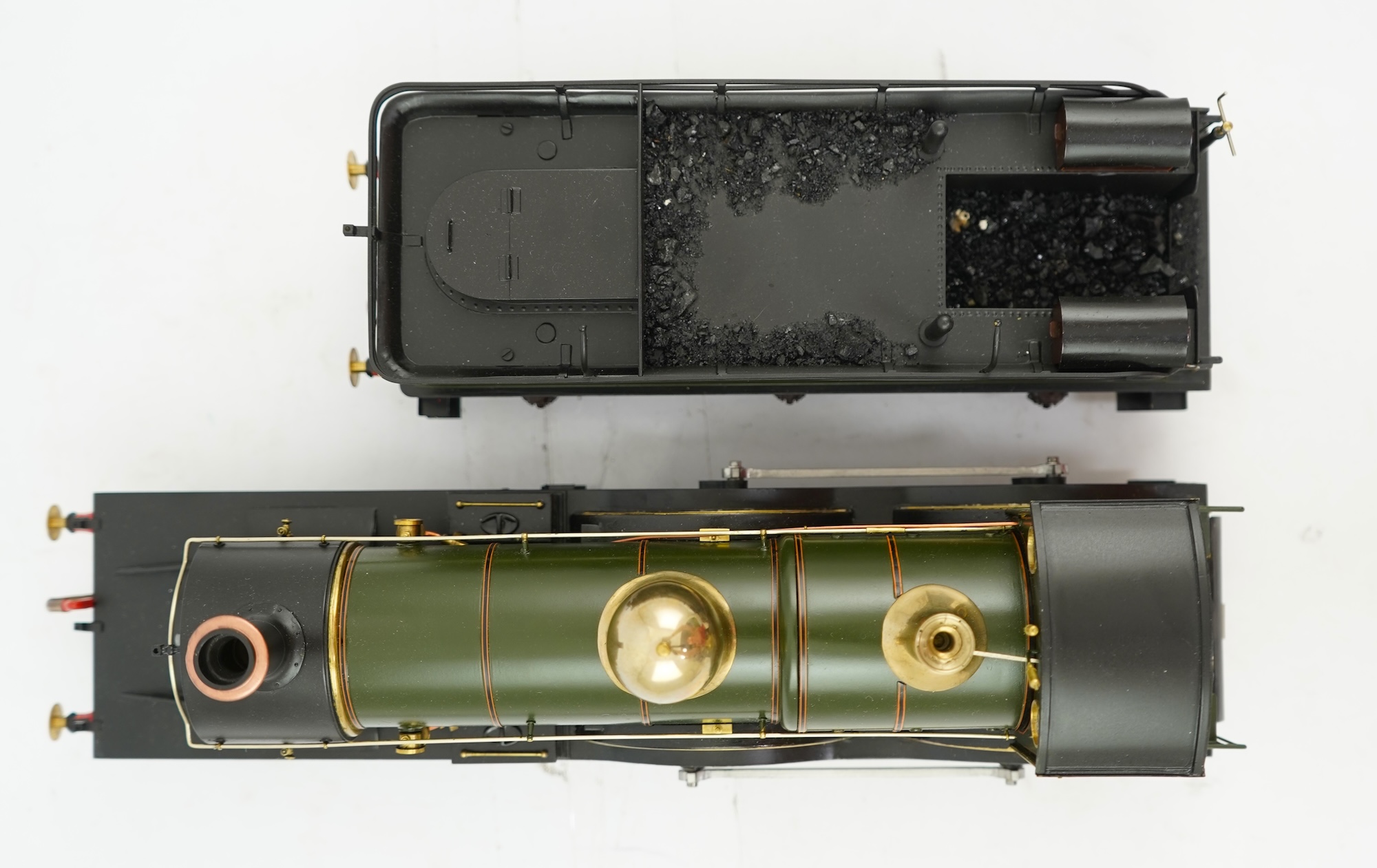 A Gauge One model of GWR Armstrong Class, Brunel 16, 4-4-0 tender locomotive, constructed, painted and lined to a very high standard and left unpowered to allow room for the detailed fire box.